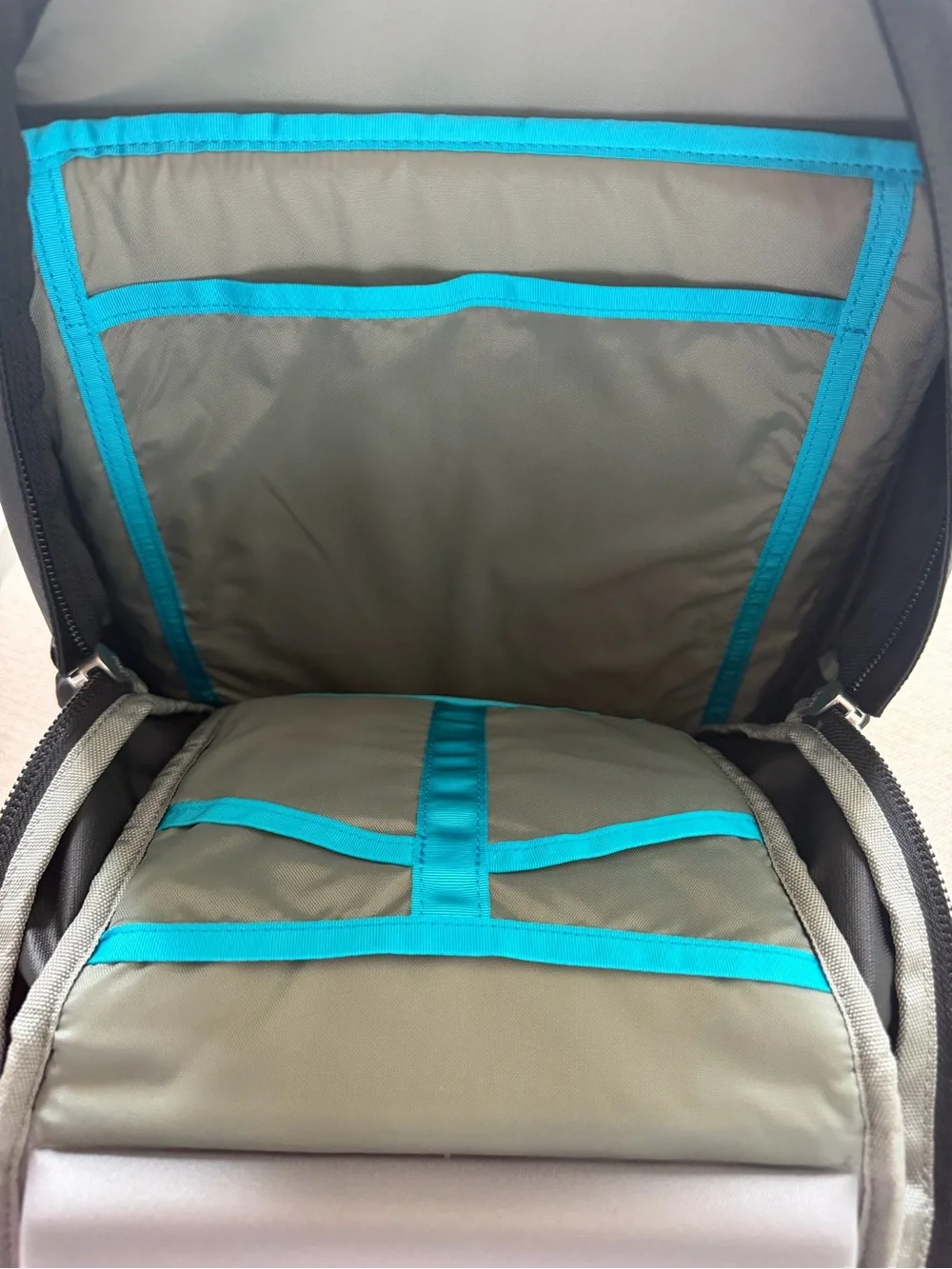 Thule Black Backpack with Aqua Zipper Pulls - Hilton Logo